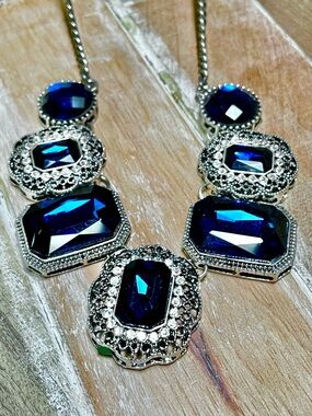 Silver-Tone Statement Necklace with Deep Blue Crystal Accents